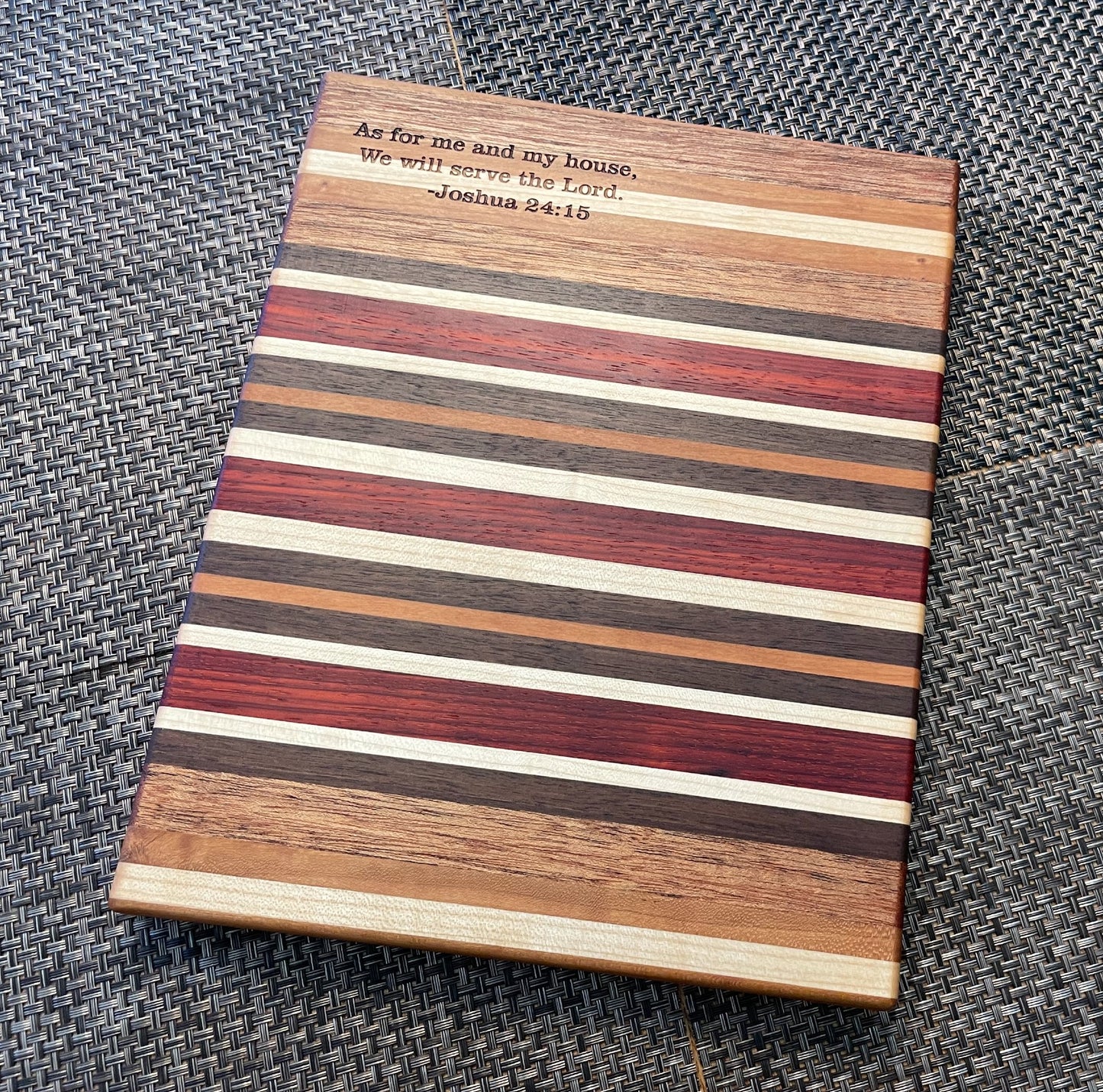 Beautiful handmade cutting board, made with both domestic and exotic hardwood. Engraved.